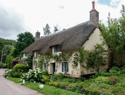 A thatched cottage in an English village